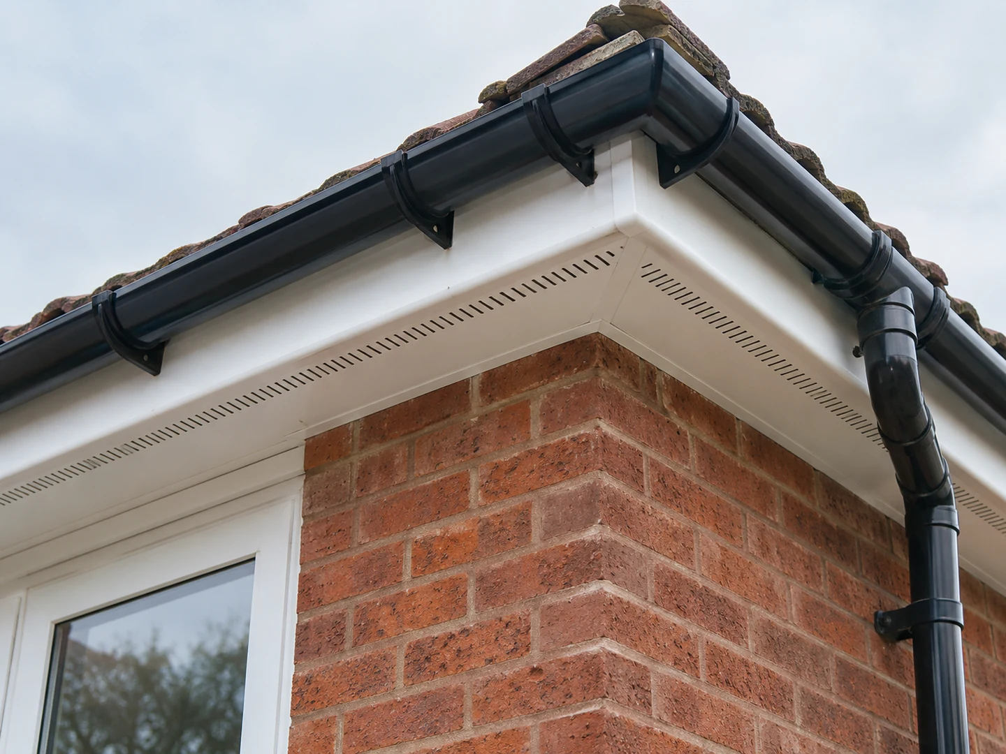Illustrative close-up of fascias soffits guttering work